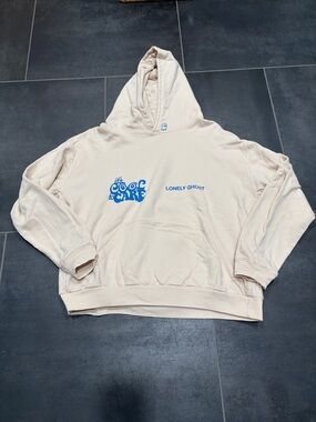 LONELY GHOST Cream Hoodie with Blue Logo